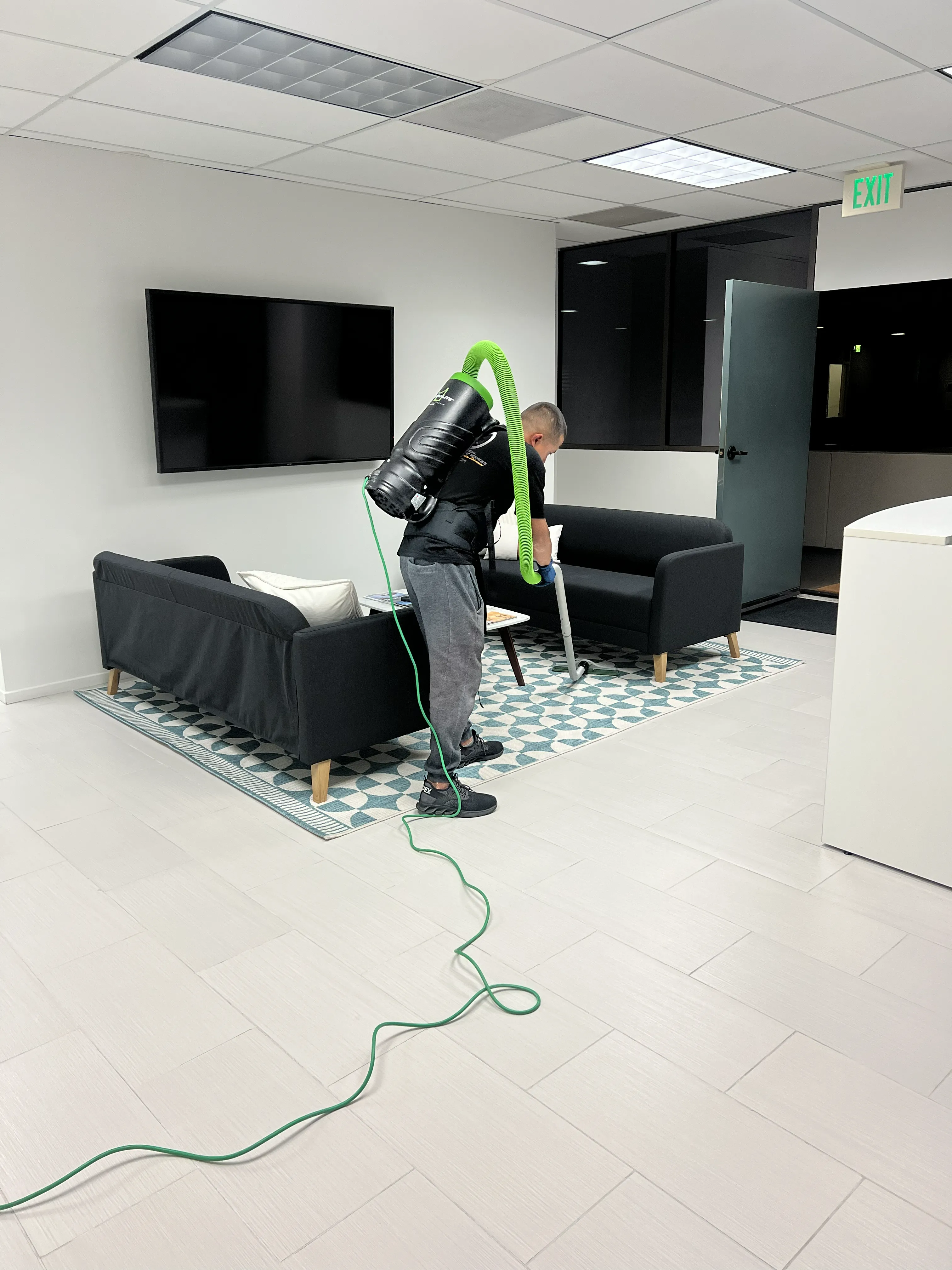 Janitors OC crew cleaning a commercial office space
